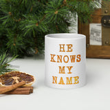 HE KNOWS MY NAME White glossy mug